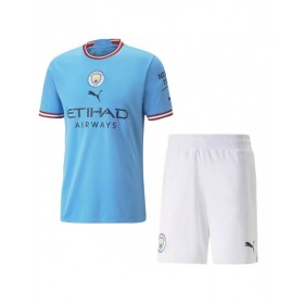 Kit de camiseta juvenil del Manchester City 2022/23 de local