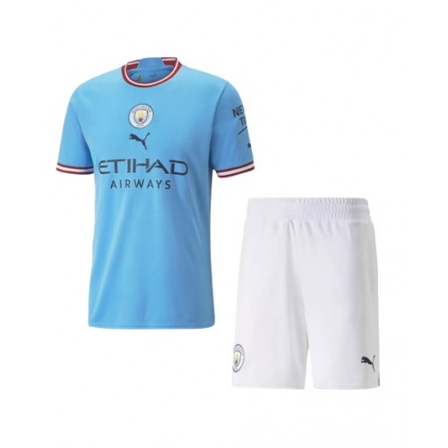 Kit de camiseta juvenil del Manchester City 2022/23 de local